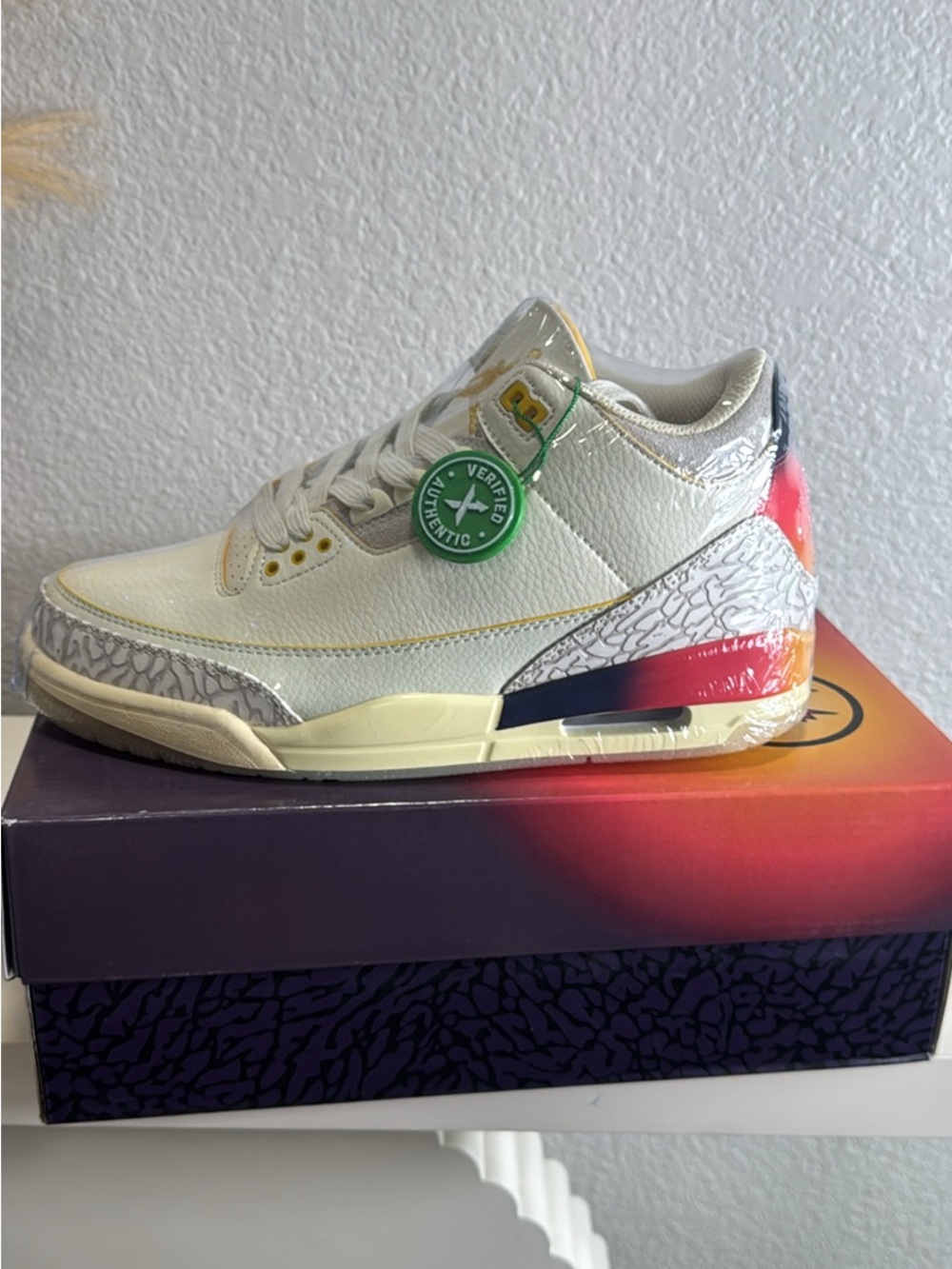 Jordan Men's White Sneakers with Multicolor Heel Accent